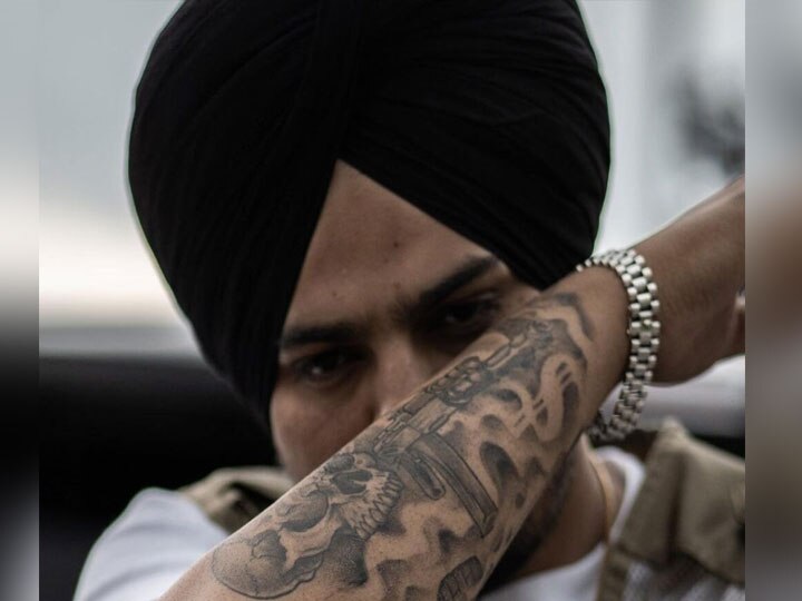 Trending news Late singer Sidhu Musewala had 6 shocking tattoos on his  body  Hindustan News Hub